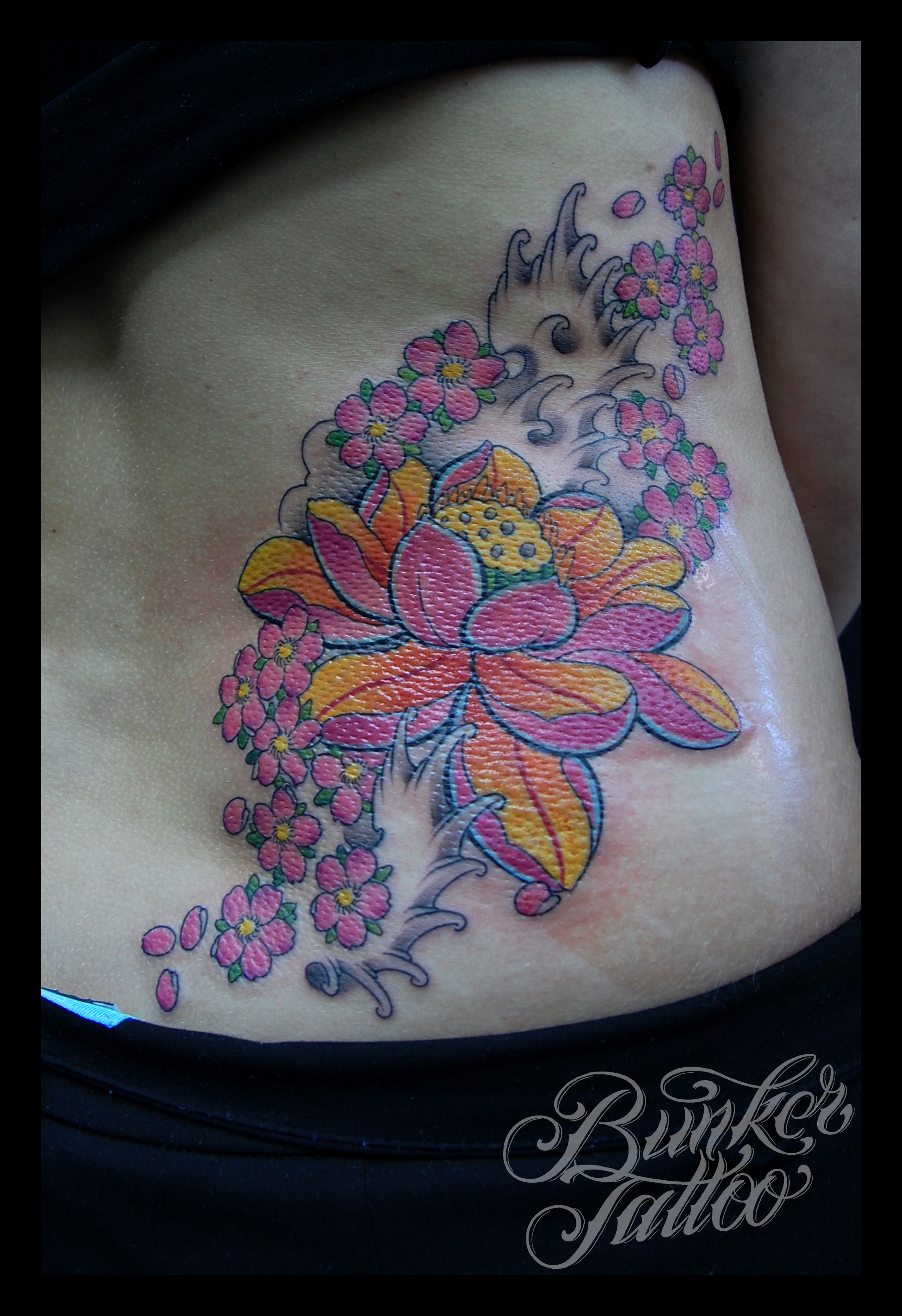 cherry blossom side tattoo